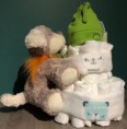 Pampertaart met knuffel en muts